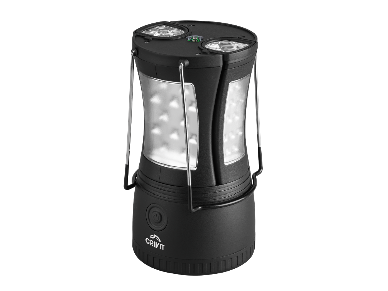Svart campinglampa med tre LED-paneler och en integrerad kompass.