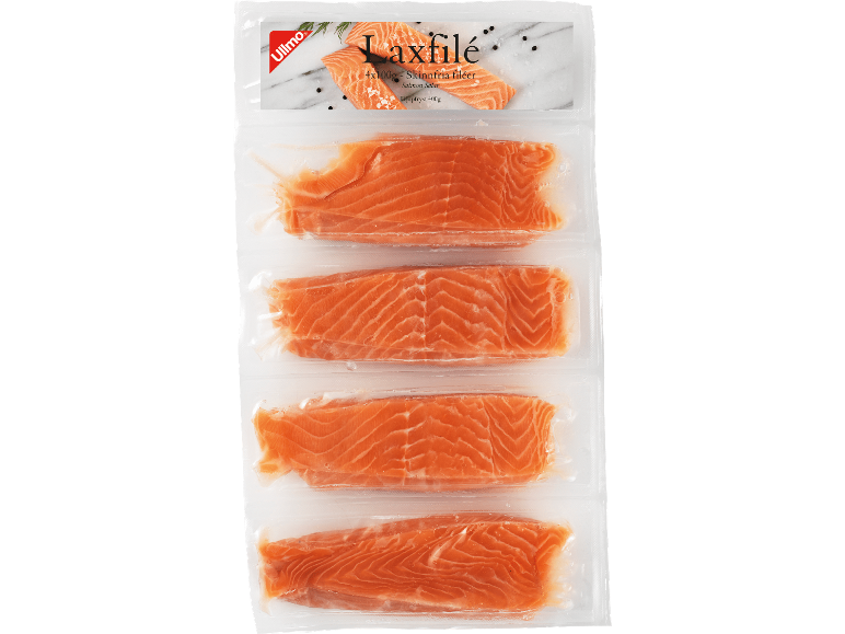 Vakuumförpackade laxfilébitar med kryddor och örter på etiketten.