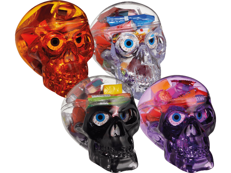 Fyra färgglada Hultén Halloween Totenkopf godisbehållare i form av dödskallar.