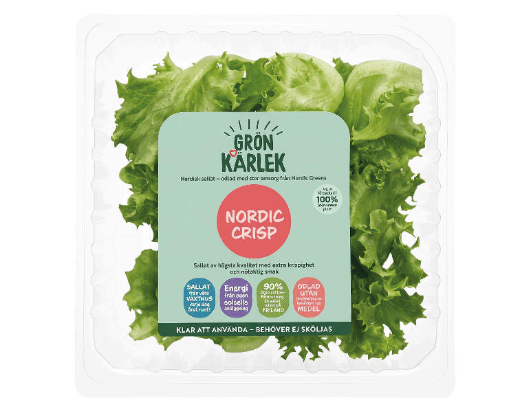 Förpackning med färsk grön sallad med svensk etikett.