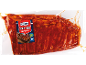 Vakuumförpackade spareribs med BBQ-sås, med texten 'Spare Ribs Western BBQ'.