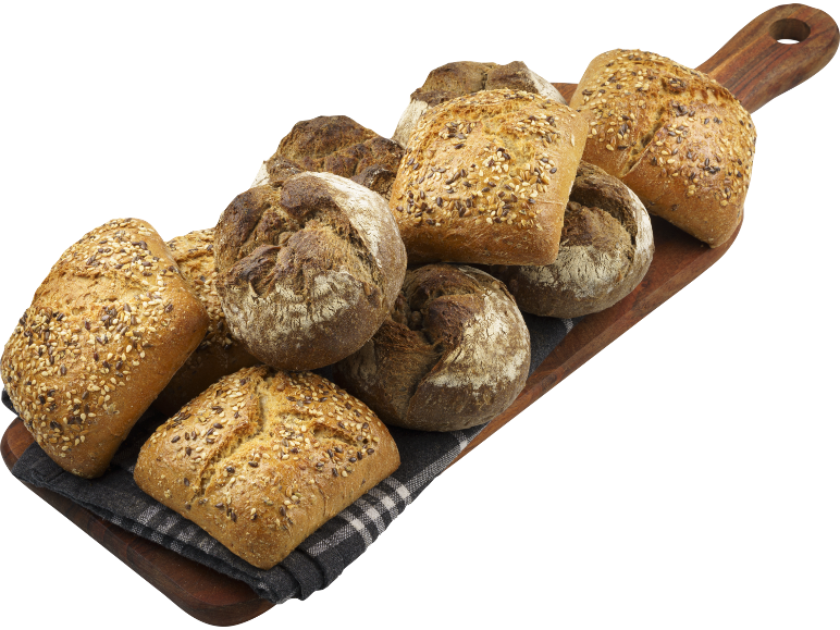 Flerkornsbullar och fullkornsrundbröd på en träskärbräda.