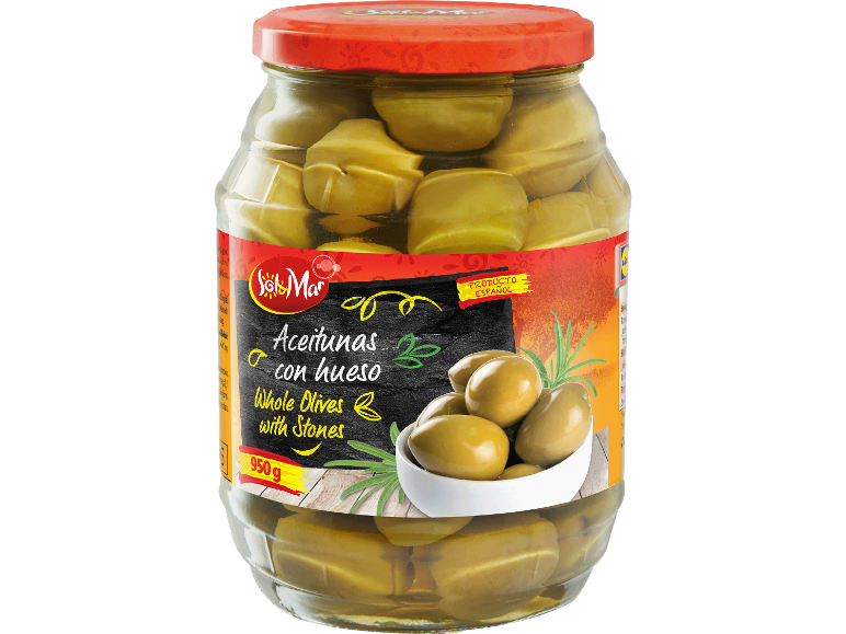 En glasburk med hela gröna oliver med kärnor, med en svart och röd etikett.