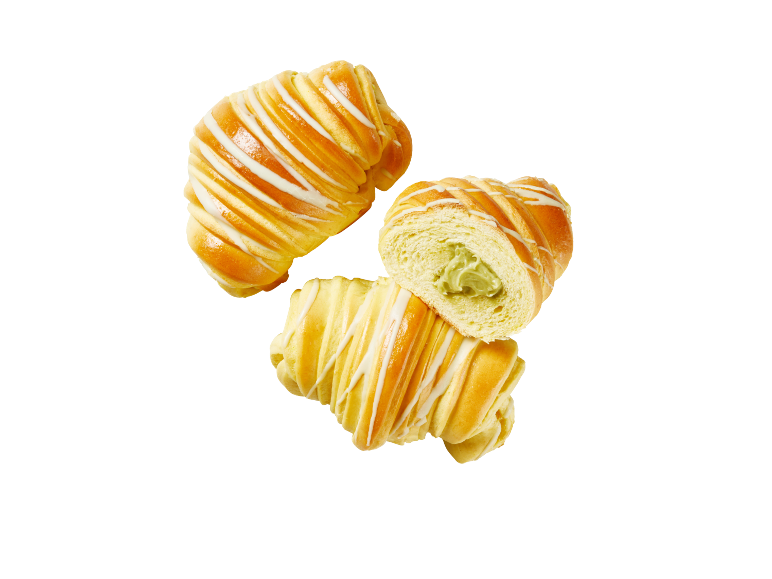 Tre söta bullar med grön fyllning och vit glasyr.