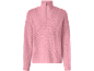 Rosa stickad tröja med dragkedja i halsen.