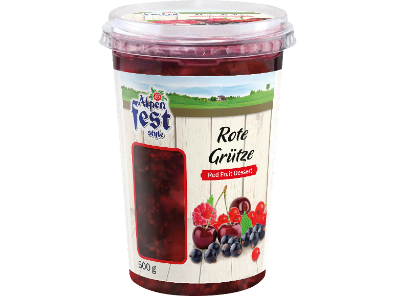 Röd fruktdessert i en transparent burk med en etikett i alpstil.