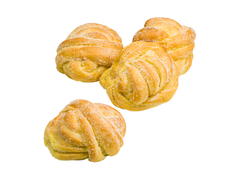 Fyra sockrade, gyllene bullar med spiralmönster på svart bakgrund.
