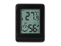 Svart digital termohygrometer med display som visar 27.9°C och 56% luftfuktighet.