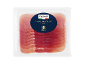 Vakuumförpackad skivad prosciutto crudo, lufttorkad skinka, mognad i 14 månader.