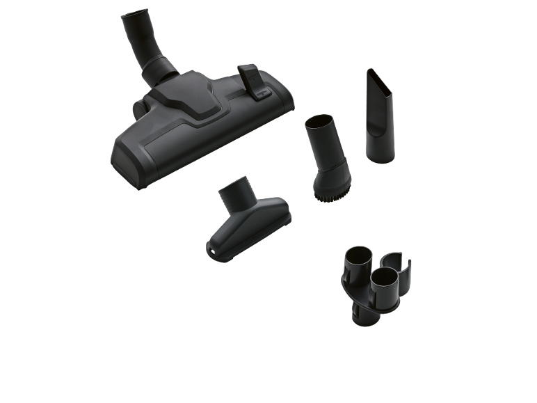 Dammsugartillbehör: golvmunstycke, fogmunstycke, borste och möbelmunstycke.