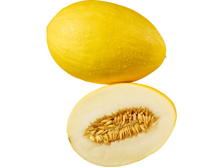 Hel och halverad gul melon med frön, med vattendroppar.