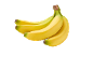 En klase gula och gröna bananer på svart bakgrund.