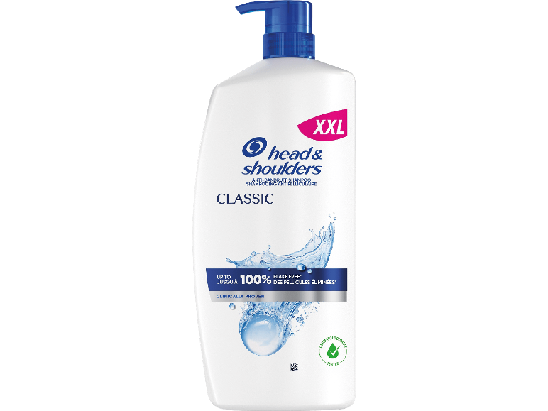 Stor flaska mjällschampo med blå pump, texten 'CLASSIC' och '100% FLAKE FREE'.