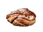 En kanelbulle toppad med pärlsocker.