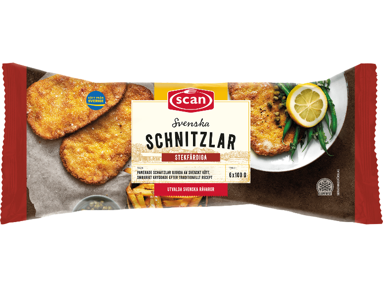 Panerade schnitzlar med citron, kapris och pommes frites, med texten 'Kött från Sverige' på förpackningen.
