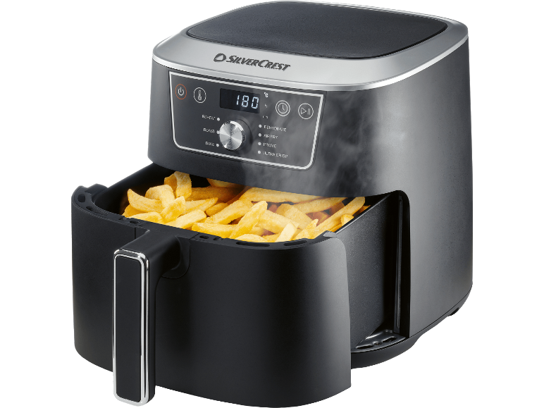 Airfryer med digital display som visar 180°C, fylld med gyllene pommes frites.