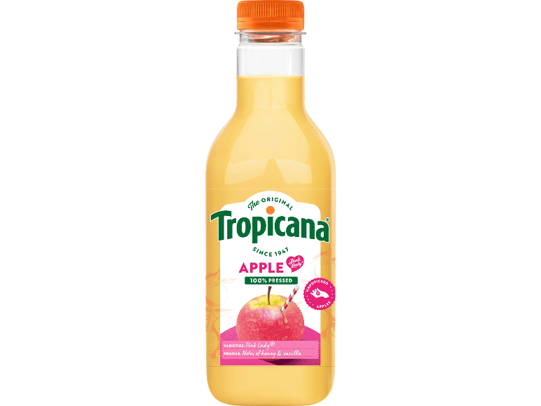 En flaska pressad äppeljuice med ett rosa äpple på etiketten