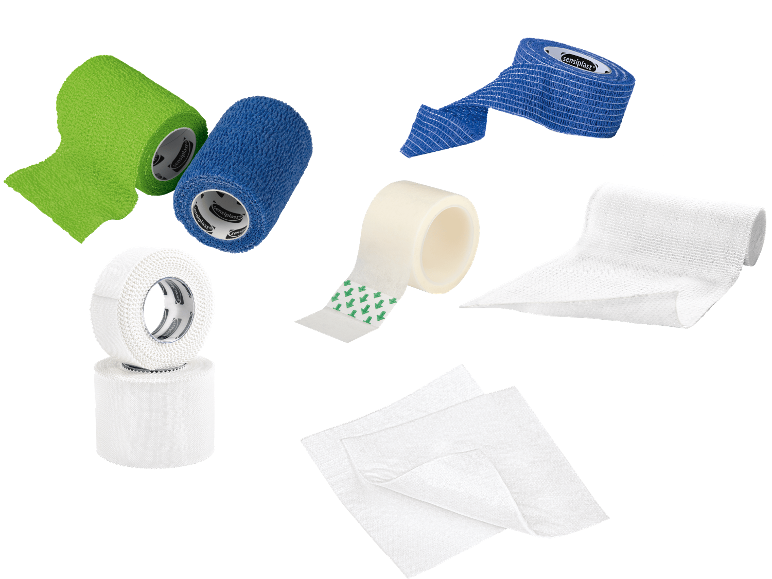 Sortiment av första hjälpen-artiklar, inklusive bandage, plåster och tejp.