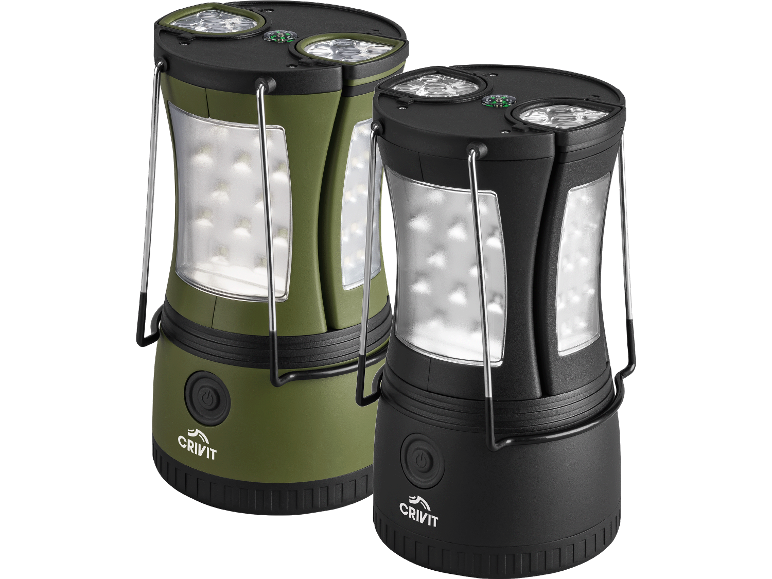 Två campinglyktor, en grön och en svart, med LED-lampor och kompass.