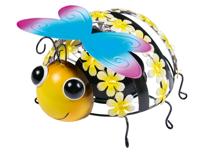 Metalldekoration i form av ett bi med blå-rosa vingar och gula blommor.