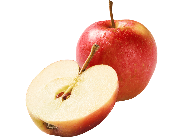 Ett helt rött äpple och ett halverat äpple på svart bakgrund.