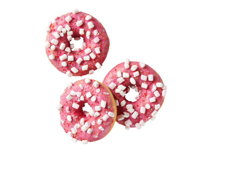 Tre rosa munkar med marshmallow- och sockerströssel.