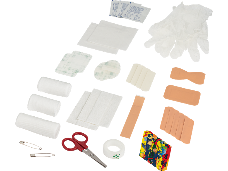 Första hjälpen-kit innehåll: bandage, gasbinda, handskar, sax, säkerhetsnålar och tejp.