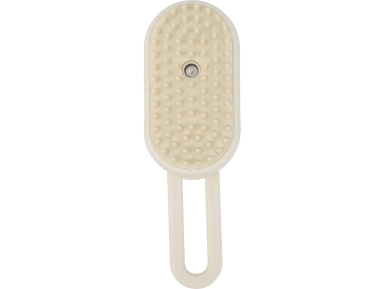 Gräddfärgad massageborste med U-format handtag och texturerade piggar.
