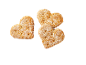 Hjärtformade kex med florsocker på svart bakgrund