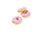 Tre munkar med rosa glasyr och vita minimarshmallows.