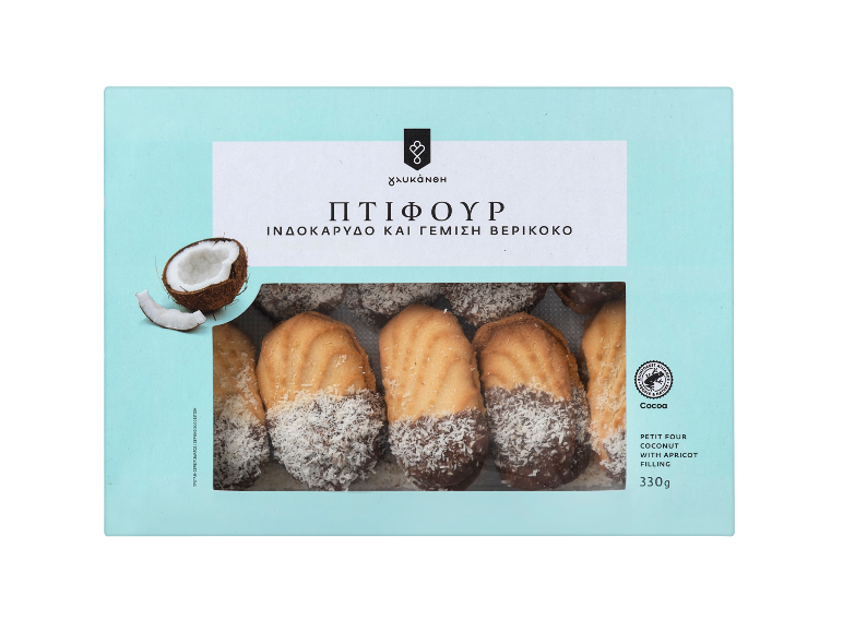 Låda med kokos petit four med aprikosfyllning, delvis doppade i choklad.