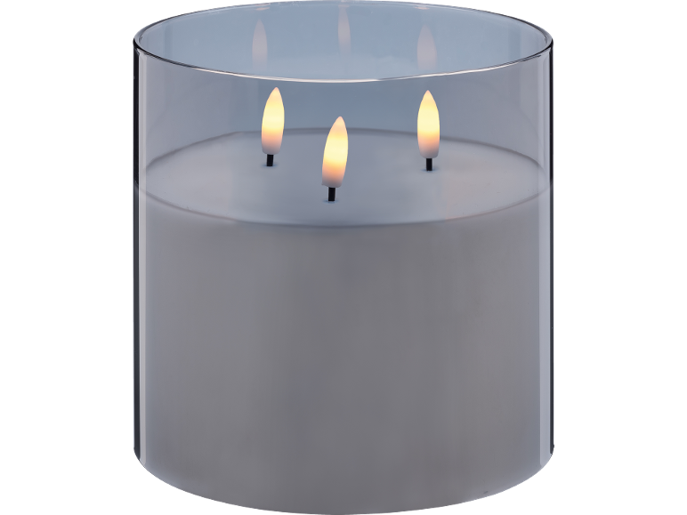Ljus med tre LED-lågor i en glashållare.