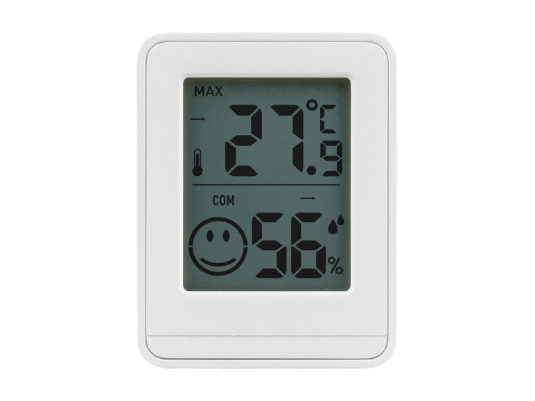 Vit digital termometer och hygrometer med LCD-skärm, visar 27.9°C och 56% luftfuktighet.