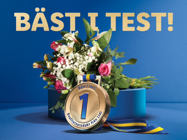 En guldmedalj med texten 'Bäst i test!' och en vacker blombukett på en blå bakgrund.