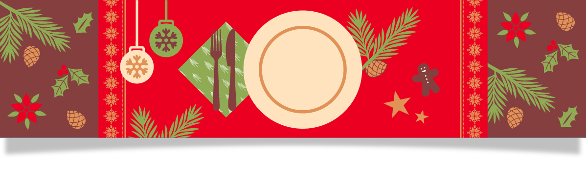 Juldukning: tallrikar, bestick, pepparkakor och julmotiv.