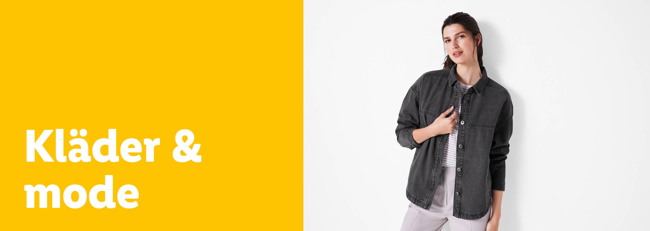 Kläder & mode: En kvinna i en mörk denimjacka.